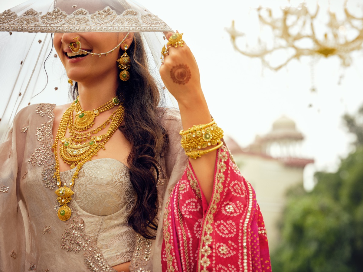 Bride smiling beneath her veil